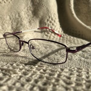 Burgundy metal frame. New. Spring hinges. Davis Vision replacement